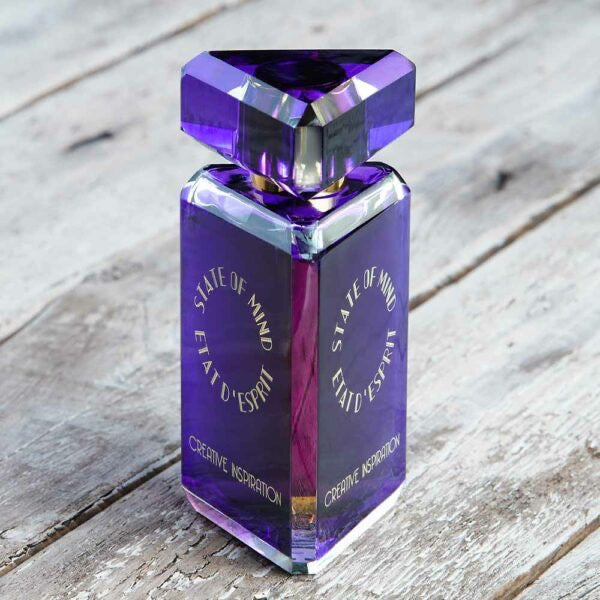 Promo shot of a bottle of perfume of State of Mind Creative Inspiration