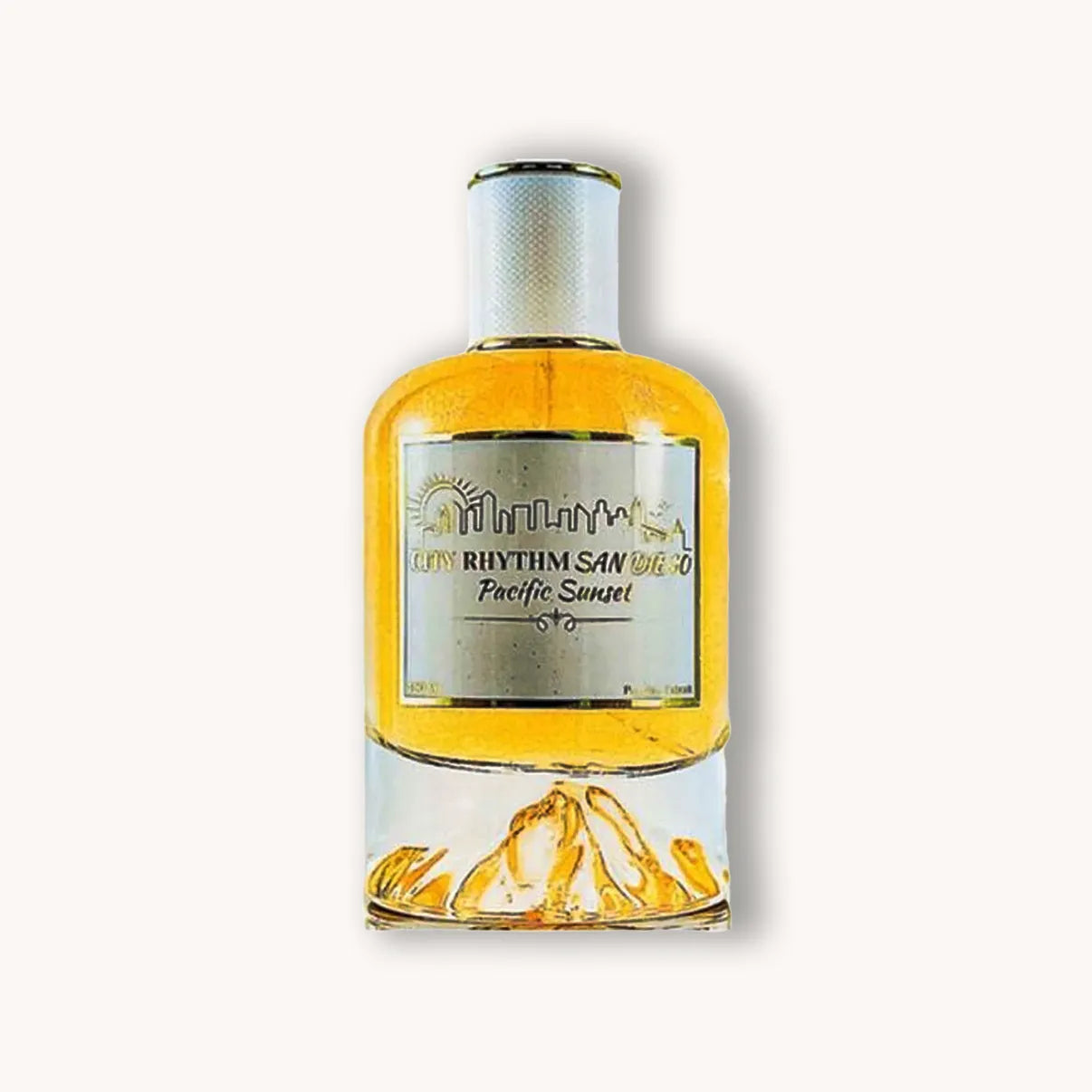 Heldere goudkleurige flacon van City Rhythm San Diego Pacific Sunset Extrait de Parfum, met witte dop en zilveren etiket met skyline en zonsondergangaccent.