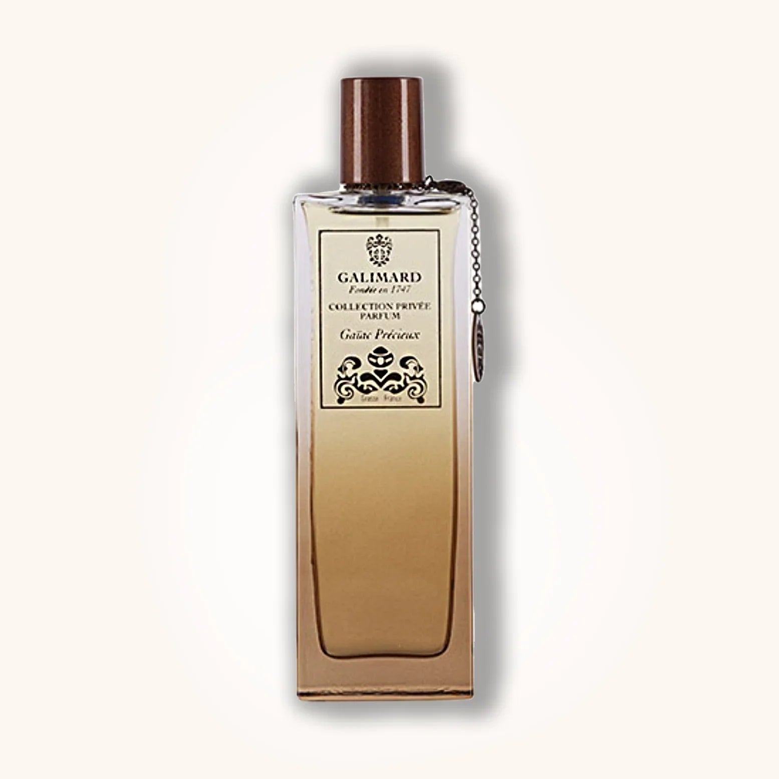 Galimard Gaïac Précieux in a beige-brown gradient bottle with signature Collection Privée design and elegant wood-colored cap.