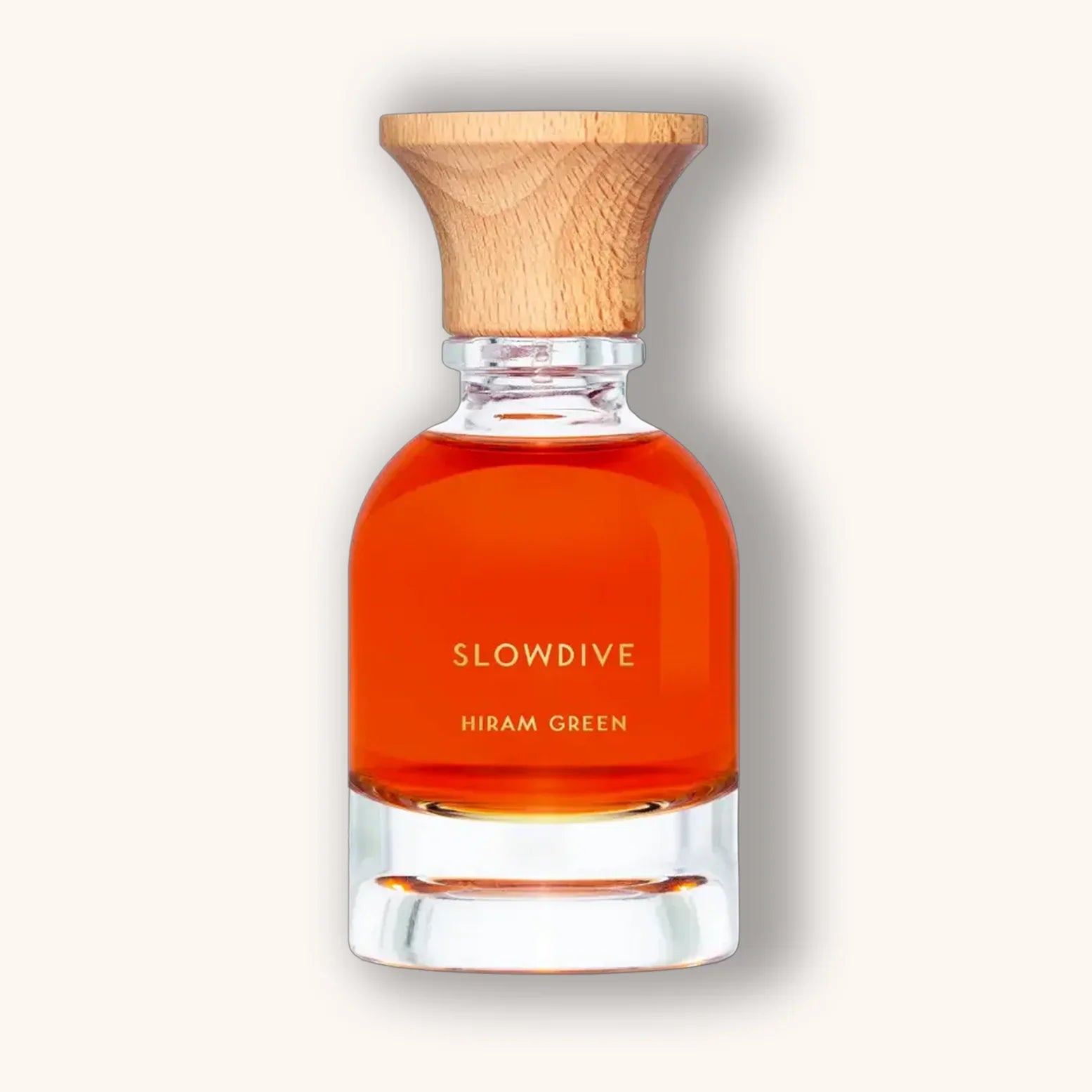 Slowdive parfum van Hiram Green met rijk amberroodkleurige vloeistof in een elegante glazen flacon in zandloper stijl