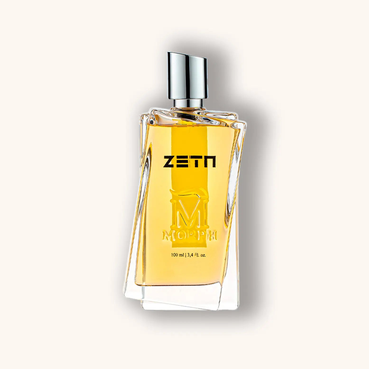 Alt text: A sleek, angular glass bottle of Morph Zeta perfume, filled with a golden liquid, featuring a stylish silver cap and the brand name 'ZETN' prominently displayed.