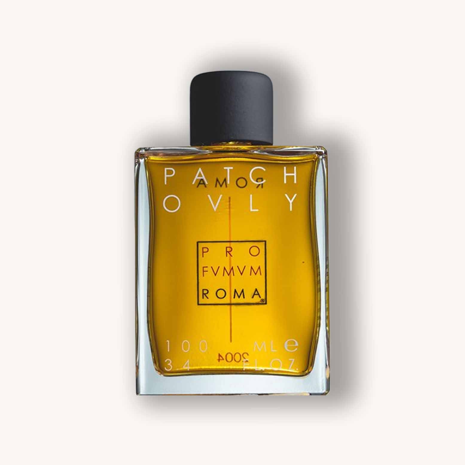 Alt text: A bottle of Profumum Roma Patchouly, featuring a rectangular glass design with bold white lettering on the front, containing a rich amber liquid. The bottle has a black cap and is set against a light background.
