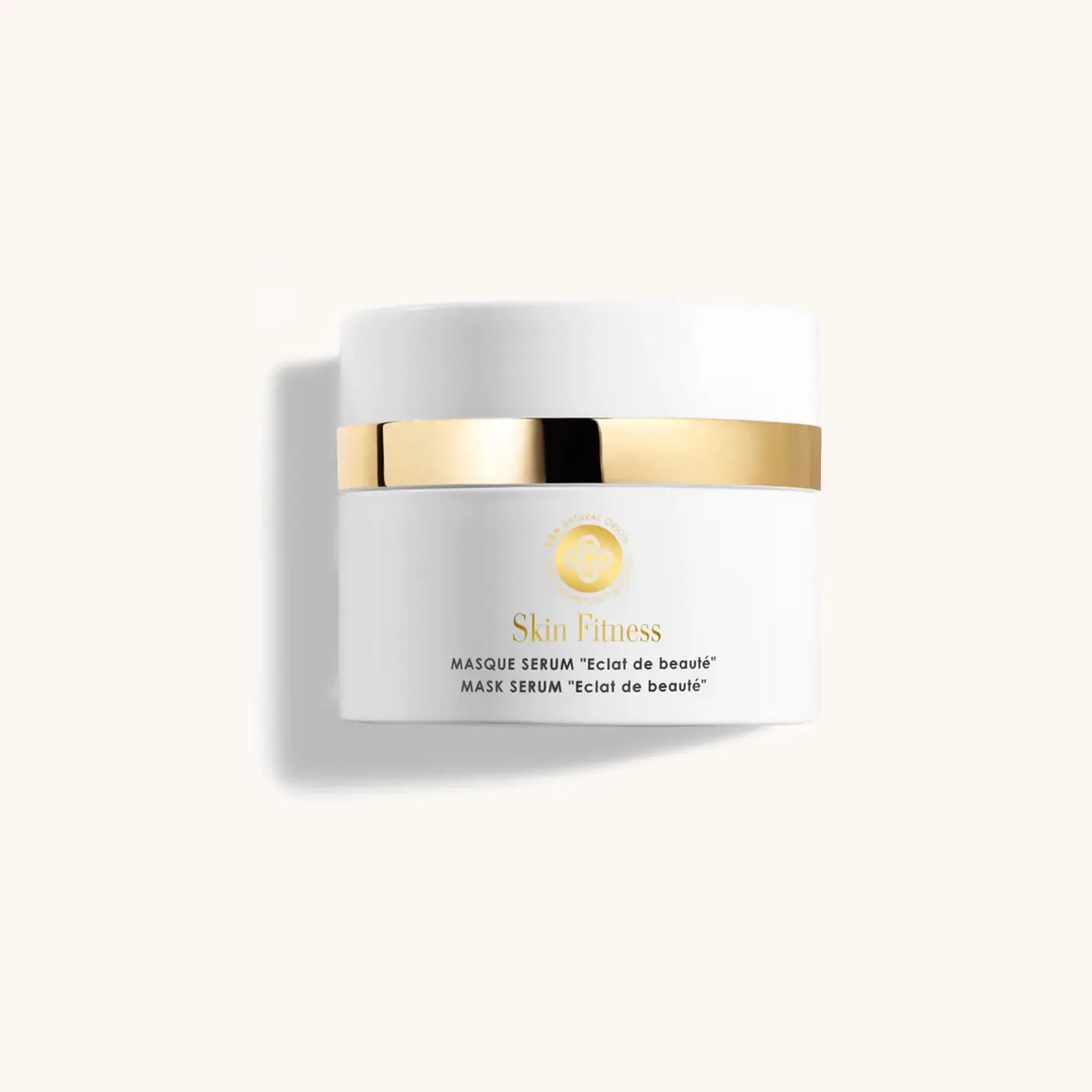 Alt text: A sleek white jar with a gold band, containing Perris Swiss Laboratory Mask Serum "Eclat de Beaute", designed to illuminate and rejuvenate the skin.