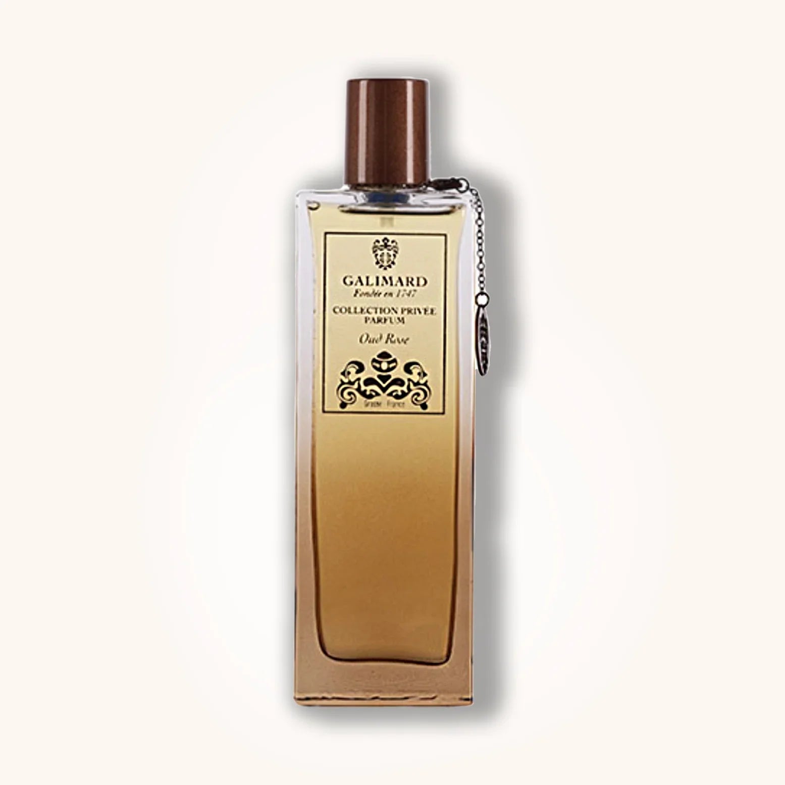 Oud Rose by Galimard in a golden ombré bottle with brown cap and elegant cream label from the Collection Privée line.