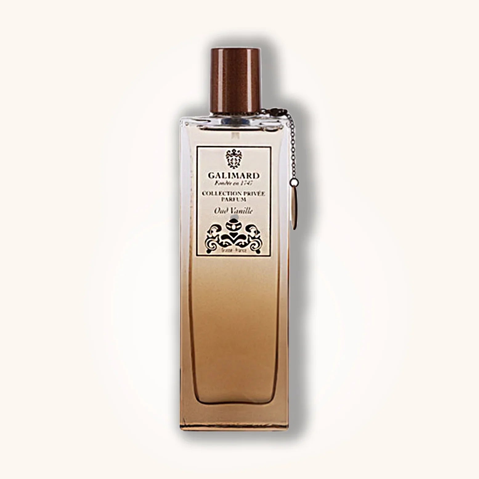 Galimard Oud Vanille perfume bottle with a warm beige gradient design and refined brown cap from the Collection Privée series.