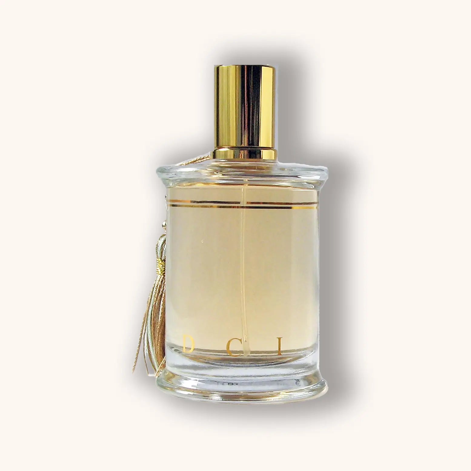 Flacon van MDCI Nuit Andalouse parfum met een licht gouden vloeistof en een ivoorkleurige kwast.