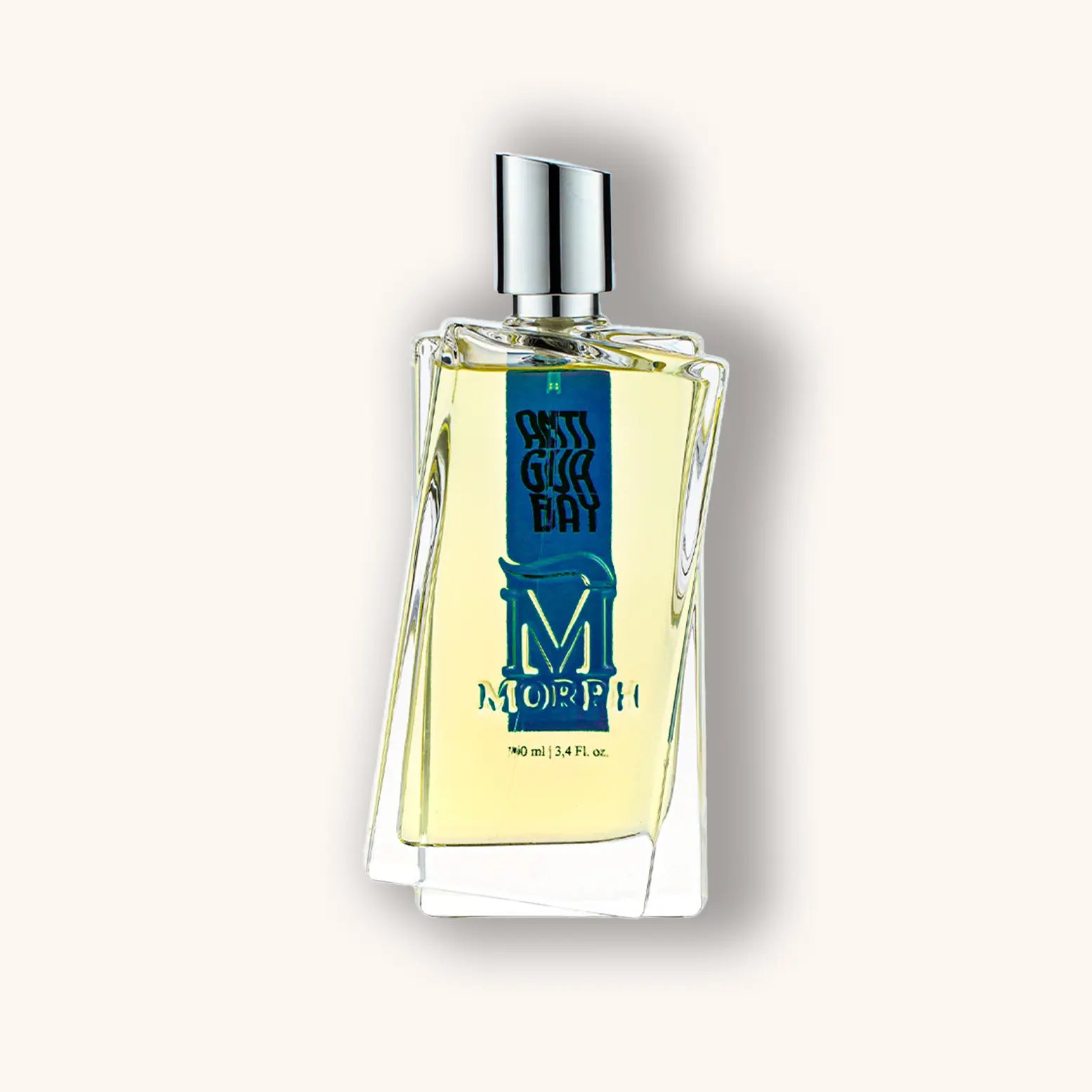 Alt text: "Morph Antigua Bay is an elegant fragrance displayed in a uniquely designed bottle, featuring a sleek silver cap and bright blue labeling. The bottle showcases the perfume’s light amber hue."