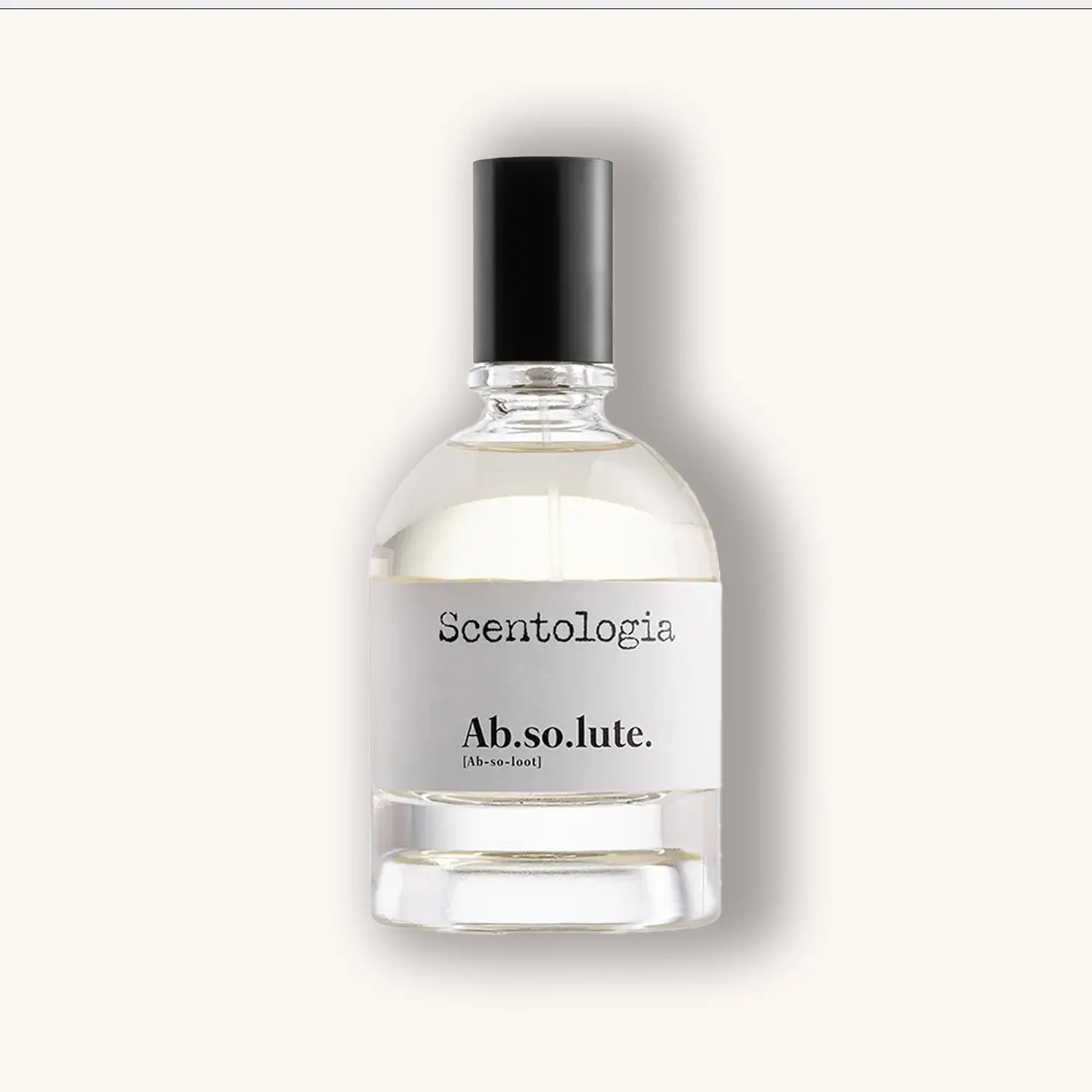 Heldere glazen flacon van Scentologia Ab.so.lute. Parfum Extrait, transparante vloeistof met minimalistisch wit label en zwarte dop.