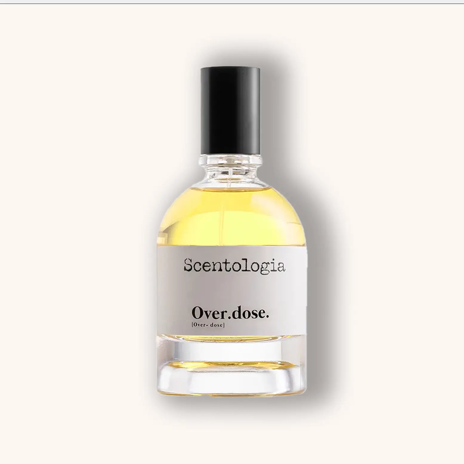 Heldere glazen flacon van Scentologia Over.dose. Parfum Extrait, met lichtgele vloeistof en minimalistisch zwart-wit label.
