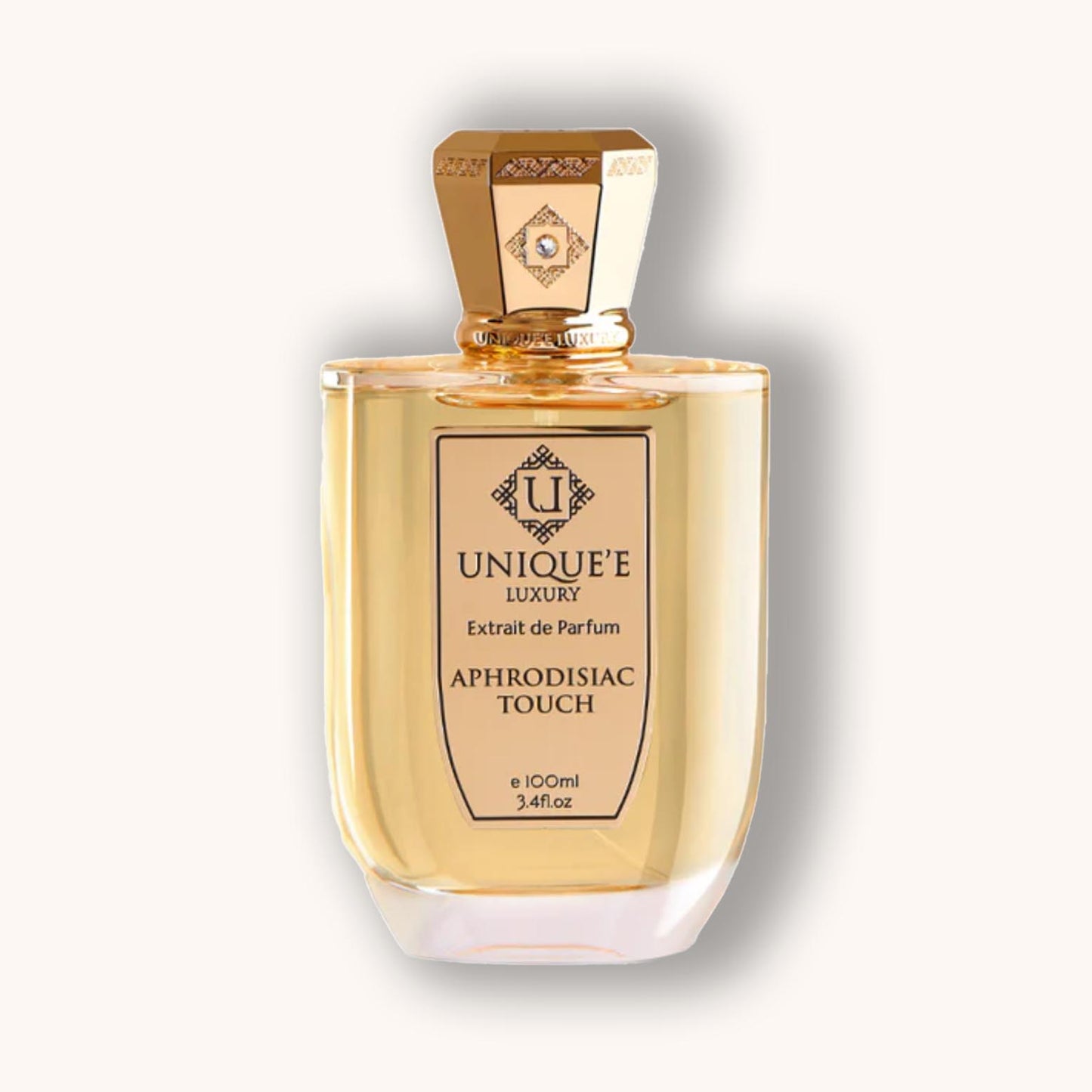 A perfume bottle of Unique'e Luxury Aphrodisiac Touch.